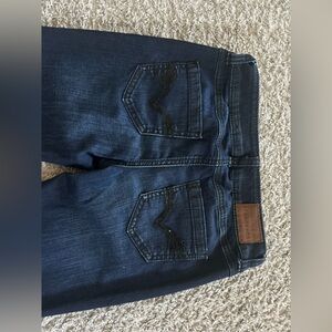 Dark Blue Denim Jeans with Black Pocket Detail